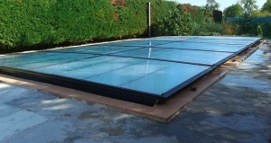 Abri de piscine plat coulissant sur mesure 100 % made in France !