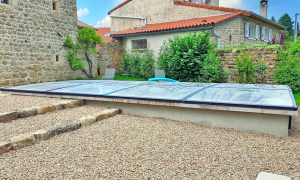Abri de piscine plat coulissant sur mesure 100 % made in France !