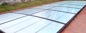 Abri de piscine plat coulissant sur mesure 100 % made in France !